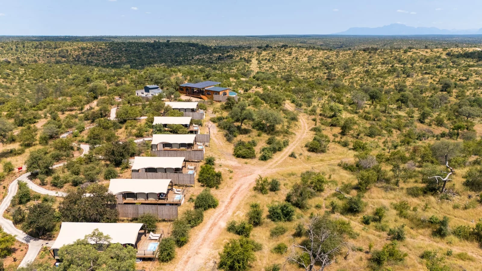 Wide aerial view of the lodge and surrounding reserve