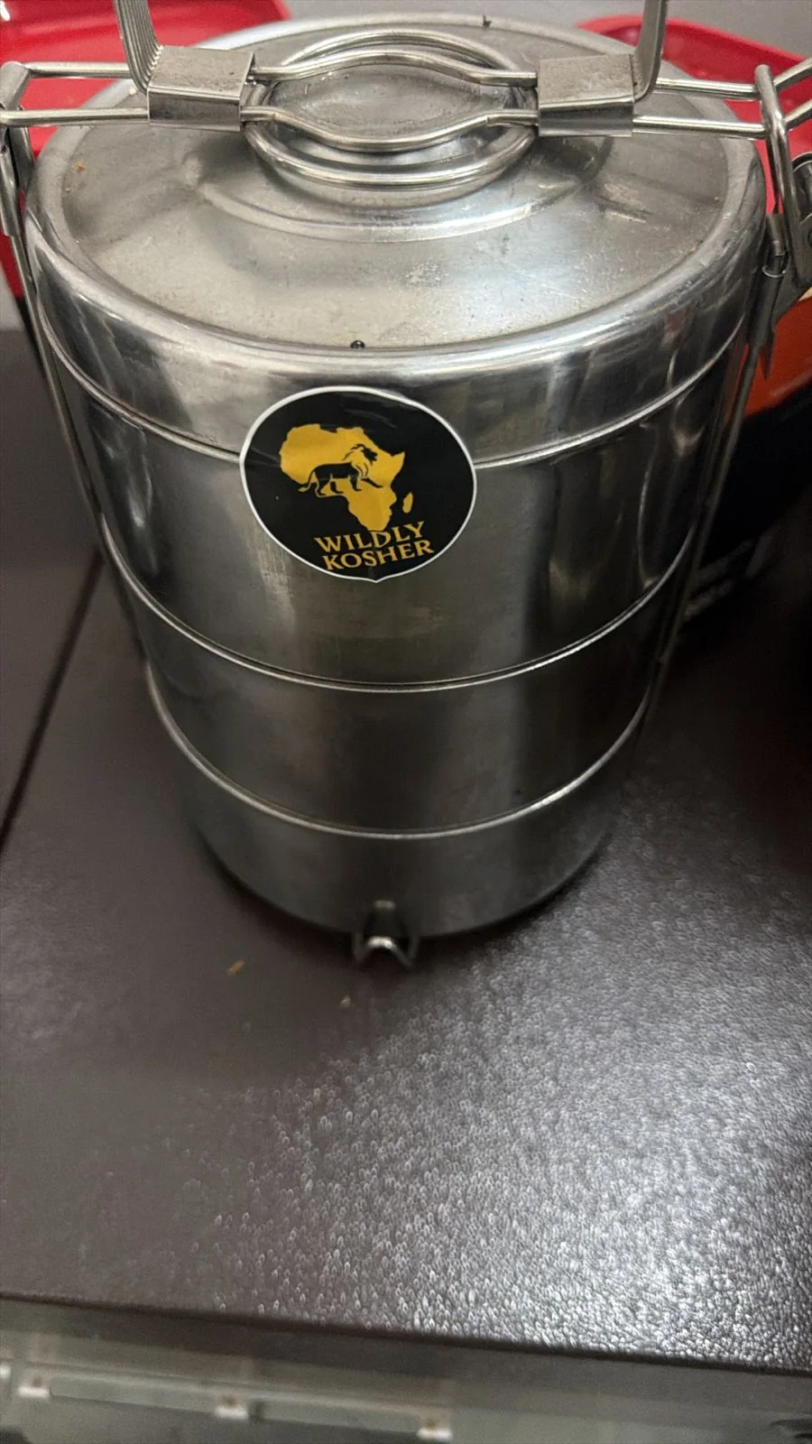 Wildly Kosher branded kosher catering tins ready for travel