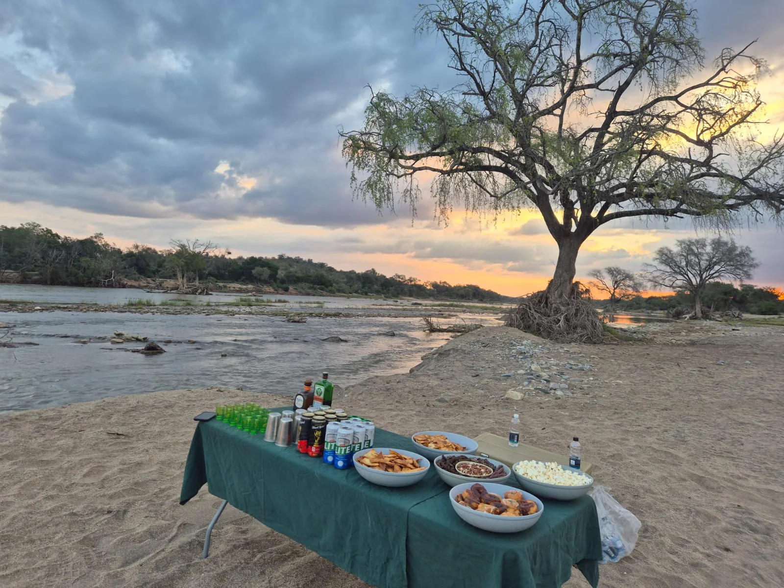 Sunset river drinks and snacks prepared for safari guests