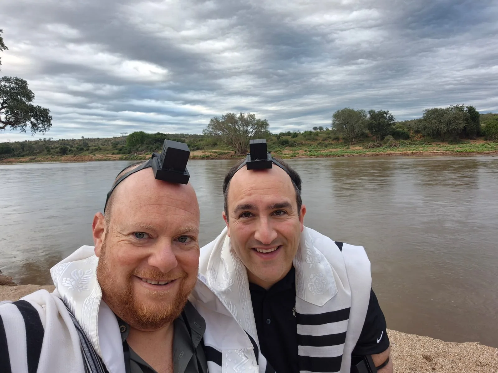 Morning prayers by the river during a kosher safari stay