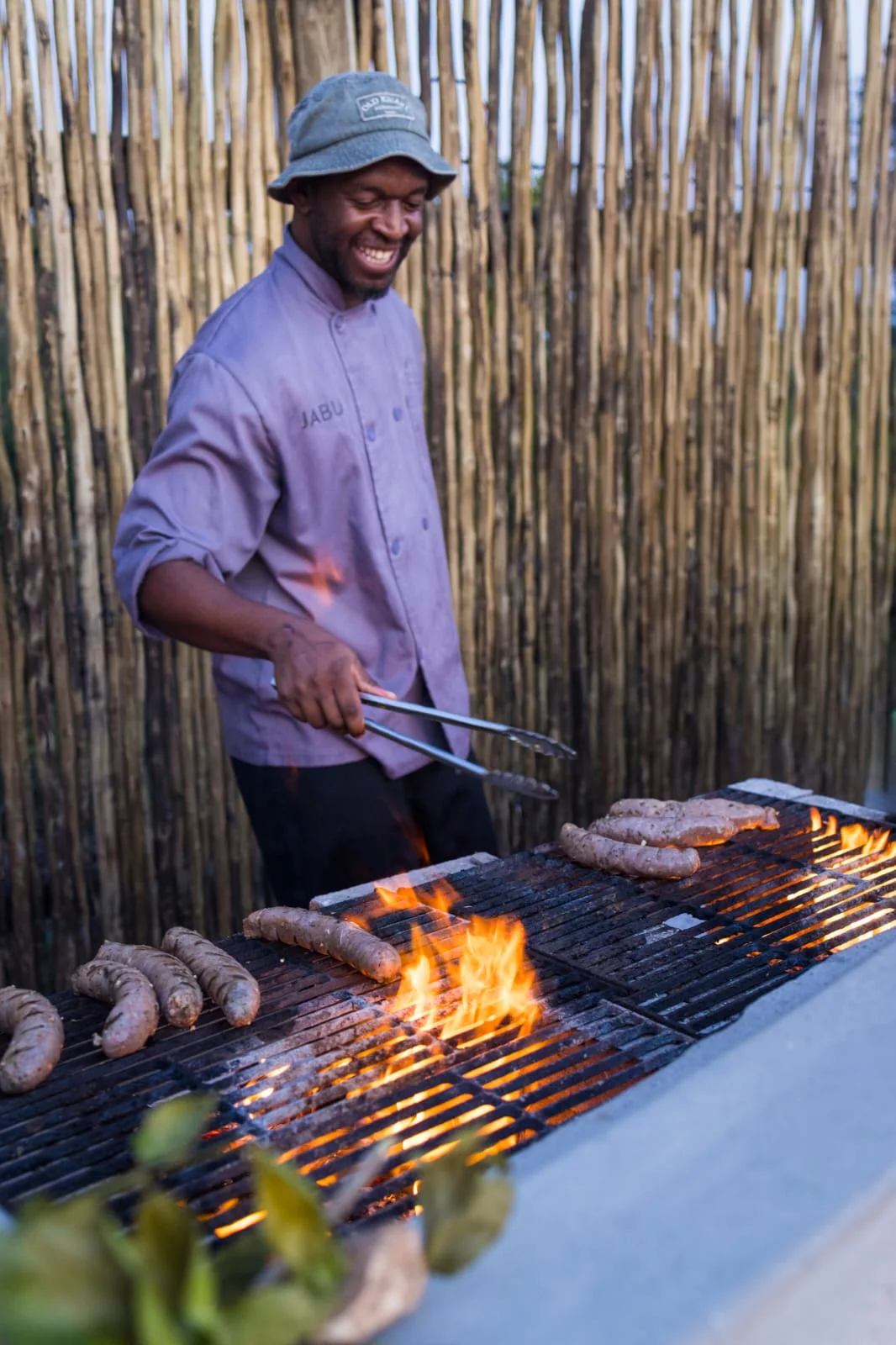 Chef preparing an outdoor grill service at the boma